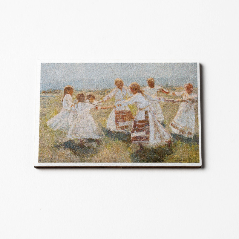 Wooden magnet with Matija Jama's Kolo motif on a white background