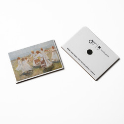 Two lying wooden magnets with the motif of Matija Jama's Kolo on a white background.