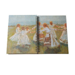 Open spiral-bound notebook with the motif of Matija Jama's Kolo