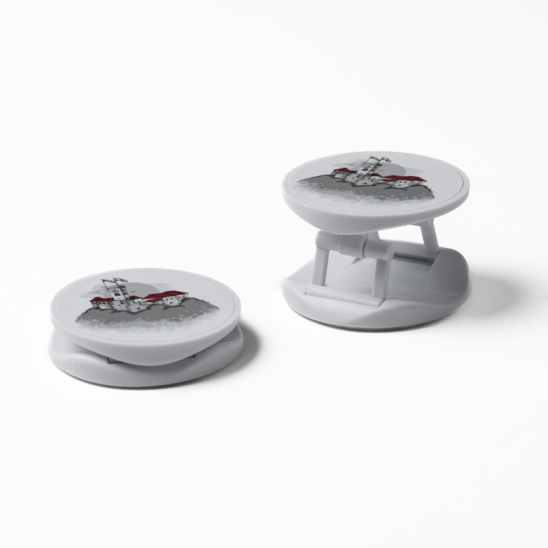 Two white phone holders with the illustrationof Ljubljana Castle, one closed and one opened